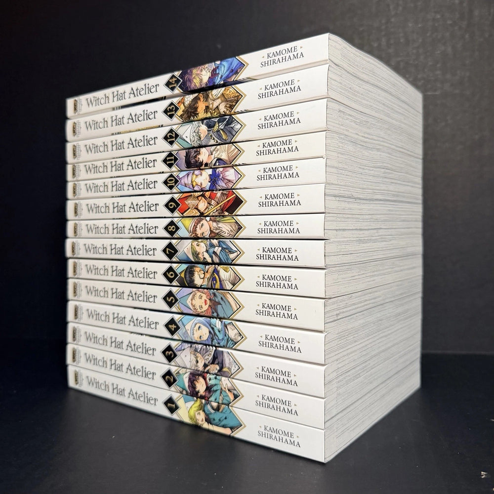 Spines of Witch Hat Atelier manga volumes 1 to 14 lined up on a shelf